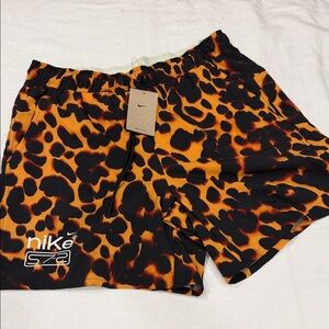 Nike Men's Athletic Shorts in Vibrant Orange and Black